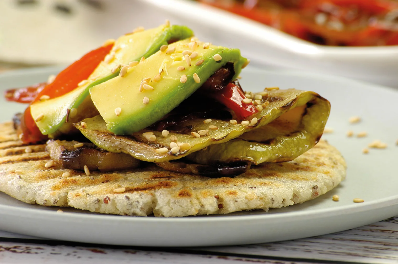 Seed arepa with grilled vegetables