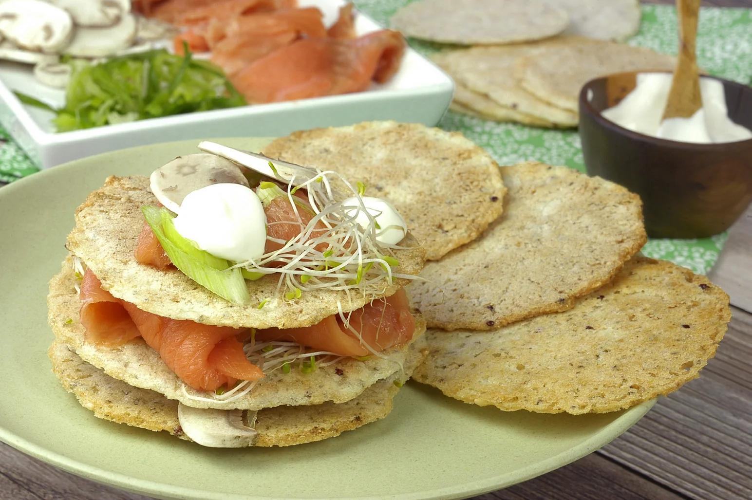 Seed tostadas with smoked salmon and sprouts